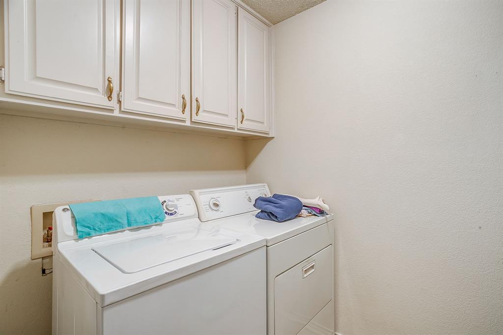 1086 Rock Ridge Drive Burleson, TX 76028 - Photo 33 of 40 a utility room with dryer and washer