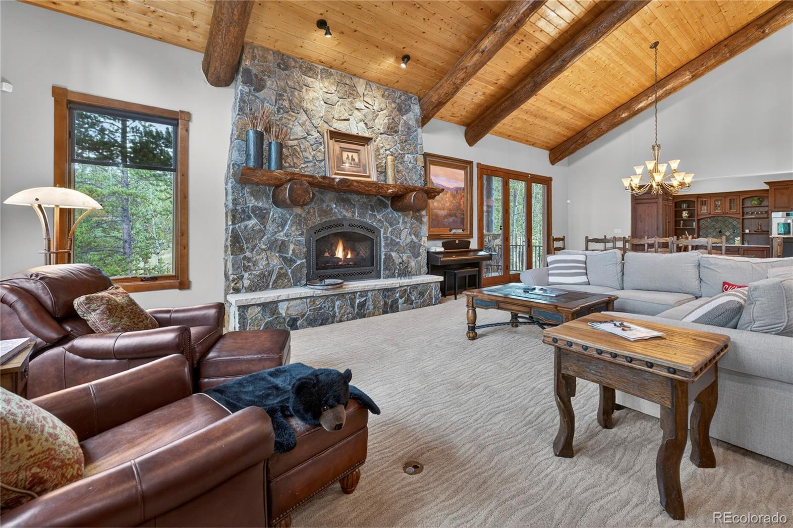 148 County Road Tabernash, CO 80478 - Photo 15 of 45 a living room with furniture and a fireplace