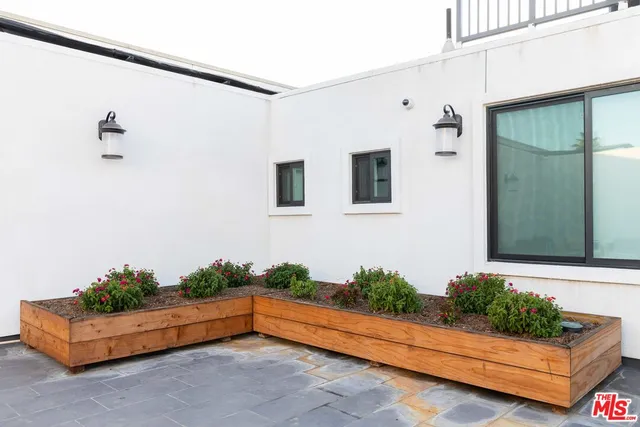 a view of parking space with parked cars