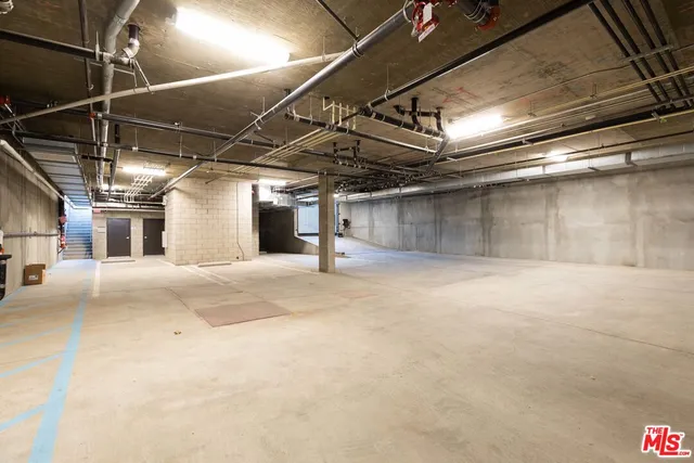 a view of multiple houses with a street