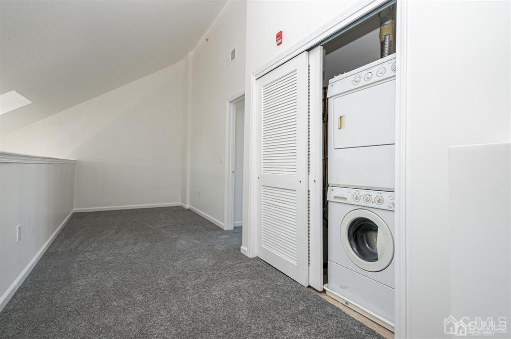 368 Rector Street, Unit 514 Perth Amboy, NJ 08861 - Photo 11 of 24 a view of a storage & utility room with washer and dryer