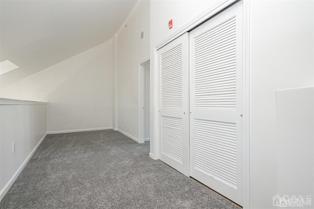 368 Rector Street, Unit 514 Perth Amboy, NJ 08861 - Photo 12 of 24 an empty room with windows