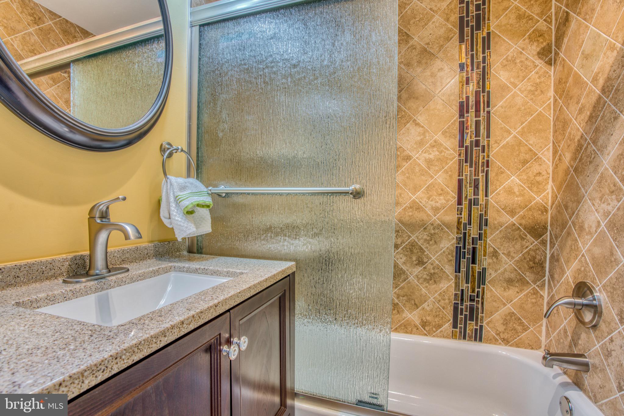 7001 Concord Road Baltimore, MD 21208 - Photo 38 of 51 Tub with glass enclosure