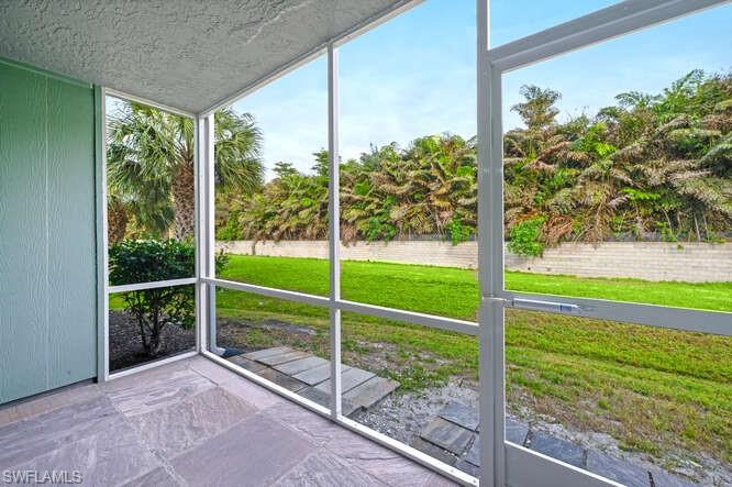 140 Cypress Way East, Unit 601 Naples, FL 34110 - Photo 22 of 27 a view of a room with porch area