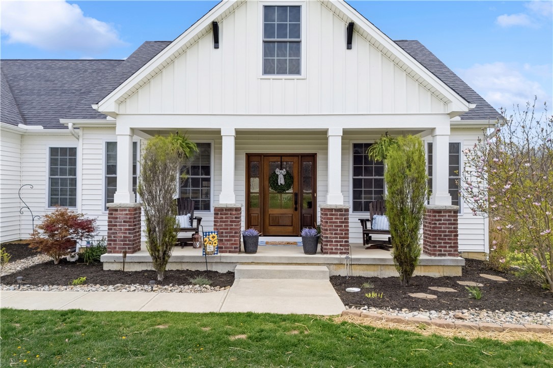 1158 Pyle Road Clarksville, OH 45113 - Photo 12 of 76 This charming residence features a welcoming porch, perfect for enjoying peaceful moments outdoors.