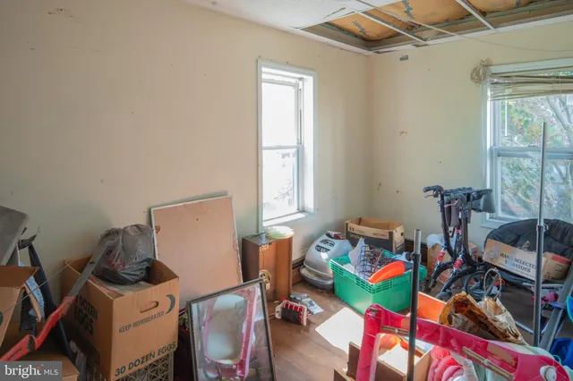 a room with furniture and a window