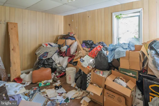 a bedroom with furniture and a bed