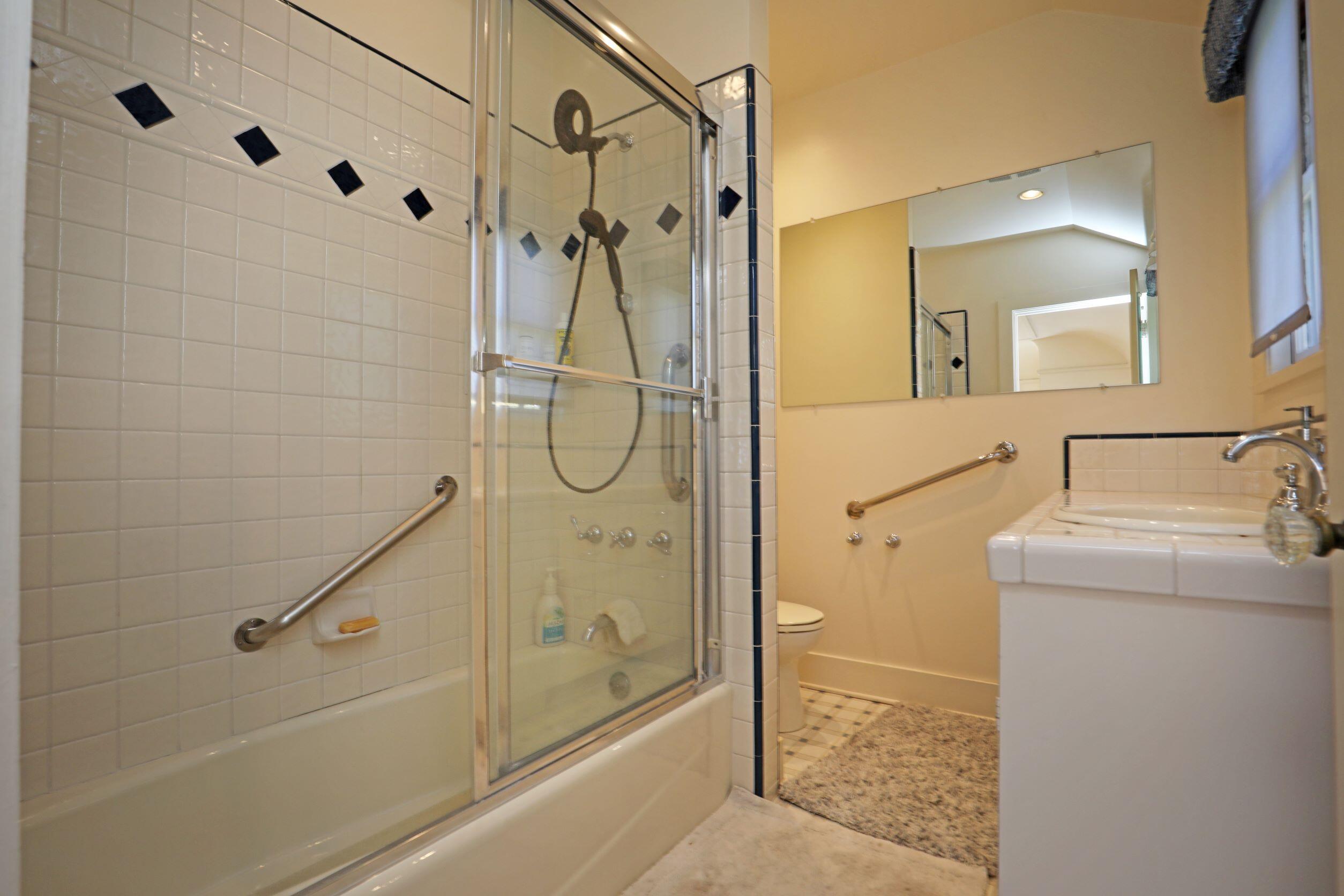 1713 Lasuen Road Santa Barbara, CA 93103 - Photo 18 of 20 a bathroom with a shower and a sink