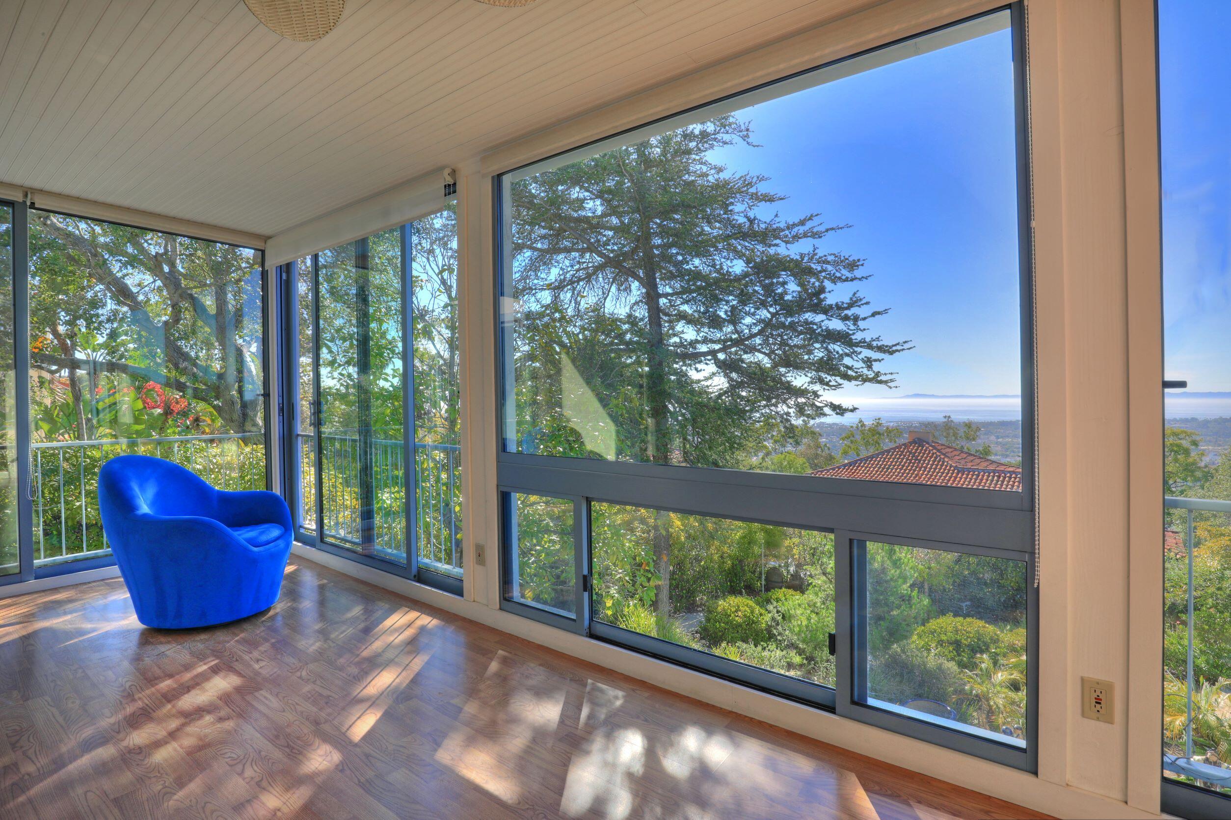 1713 Lasuen Road Santa Barbara, CA 93103 - Photo 8 of 20 a view of an empty room and balcony with furniture