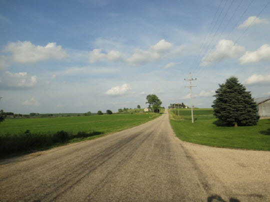 4007 East Lamm Road Freeport, IL 61032 - Photo 3 of 11 a view of a street with next to a yard