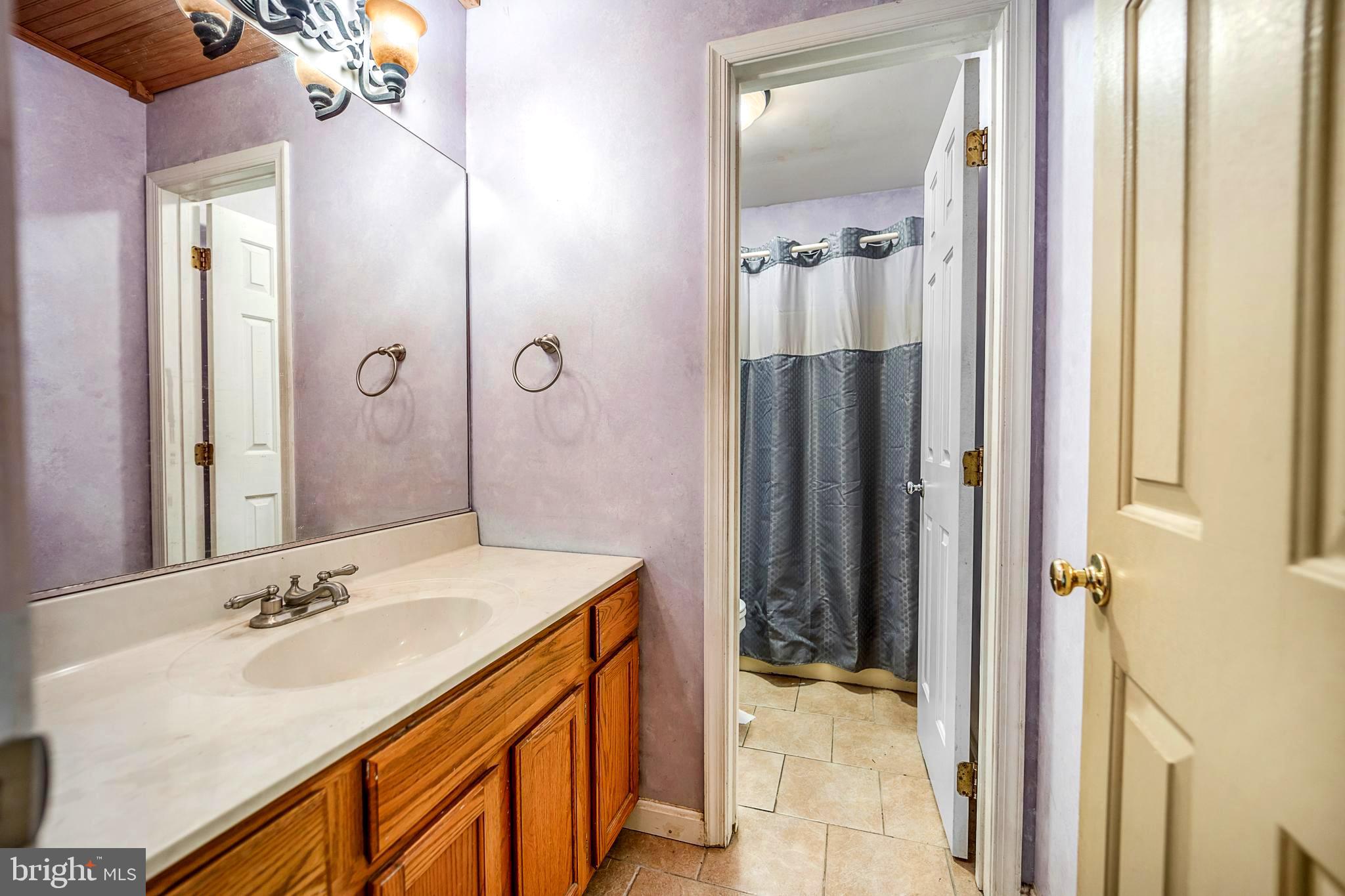 1070 Wrighton Road Lothian, MD 20711 - Photo 12 of 16 Hall Bath