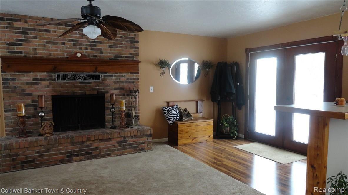 4696 North Nicholson Road Fowlerville, MI 48836 - Photo 14 of 42 Entry and Fireplace.JPG