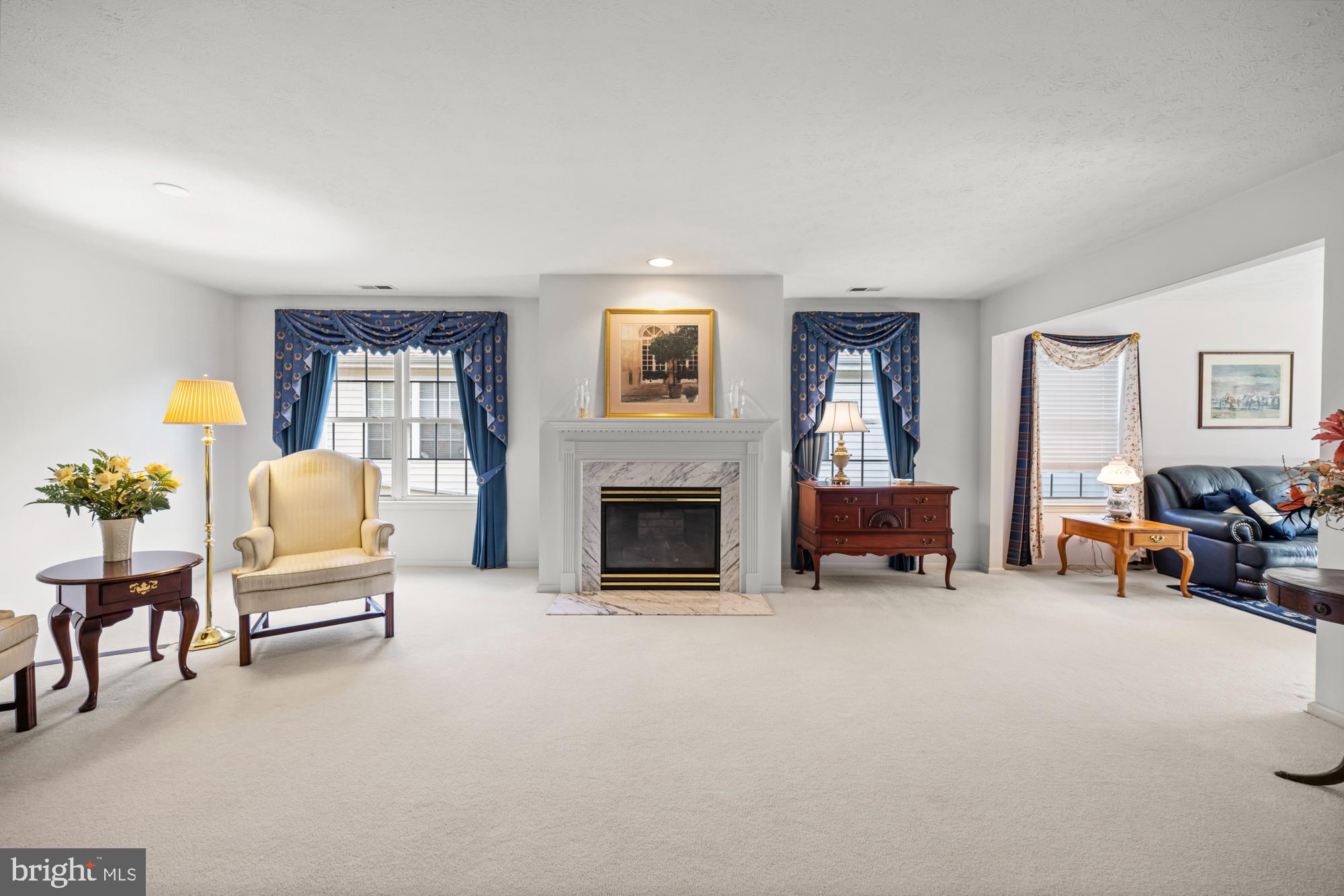 21 Brandon Lane Sewell, NJ 08080 - Photo 12 of 44 a living room with furniture and a fireplace