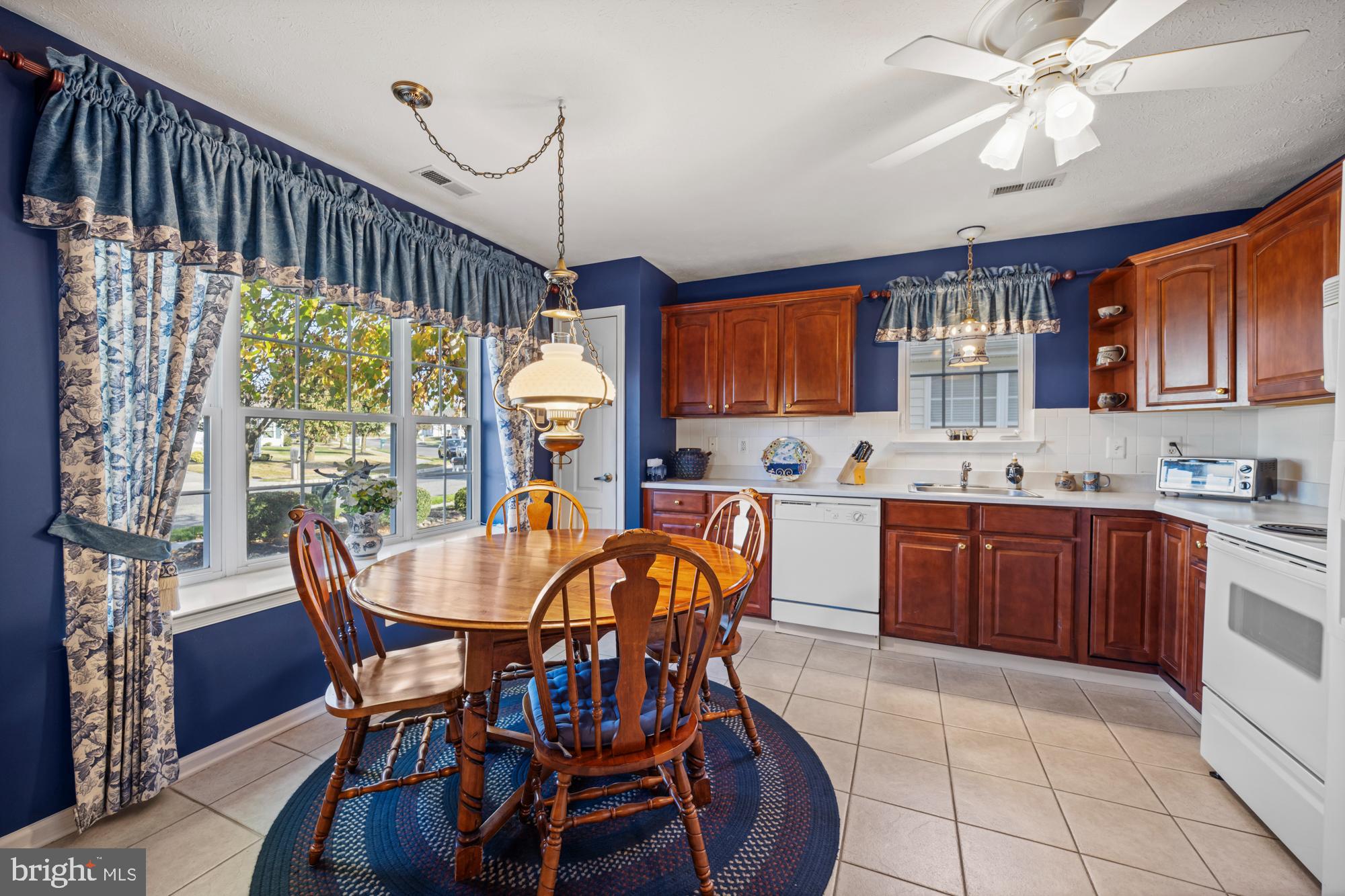 21 Brandon Lane Sewell, NJ 08080 - Photo 2 of 44 a view of a dining room with furniture window and outside view