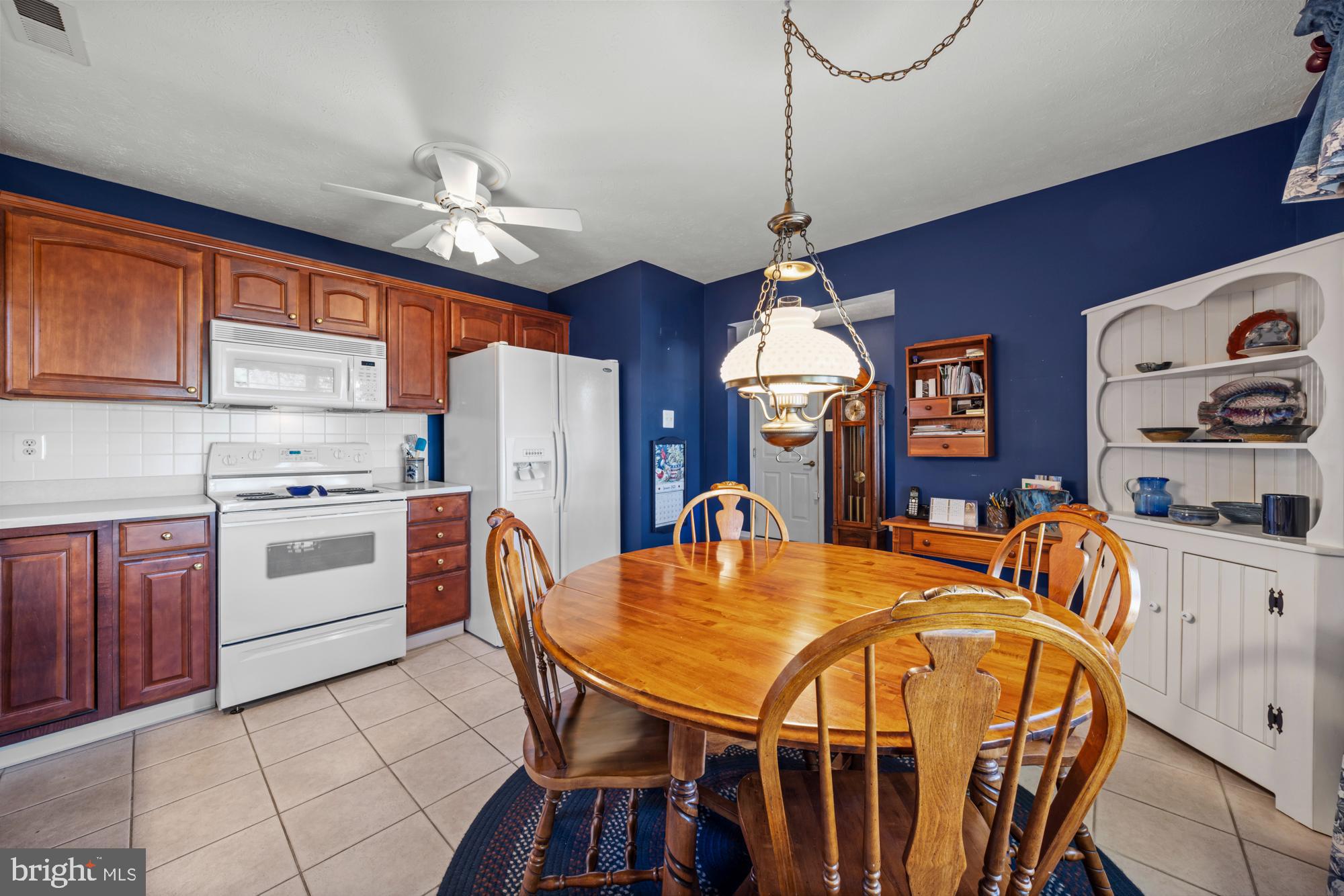 21 Brandon Lane Sewell, NJ 08080 - Photo 4 of 44 a view of a dining room with furniture window and wooden floor