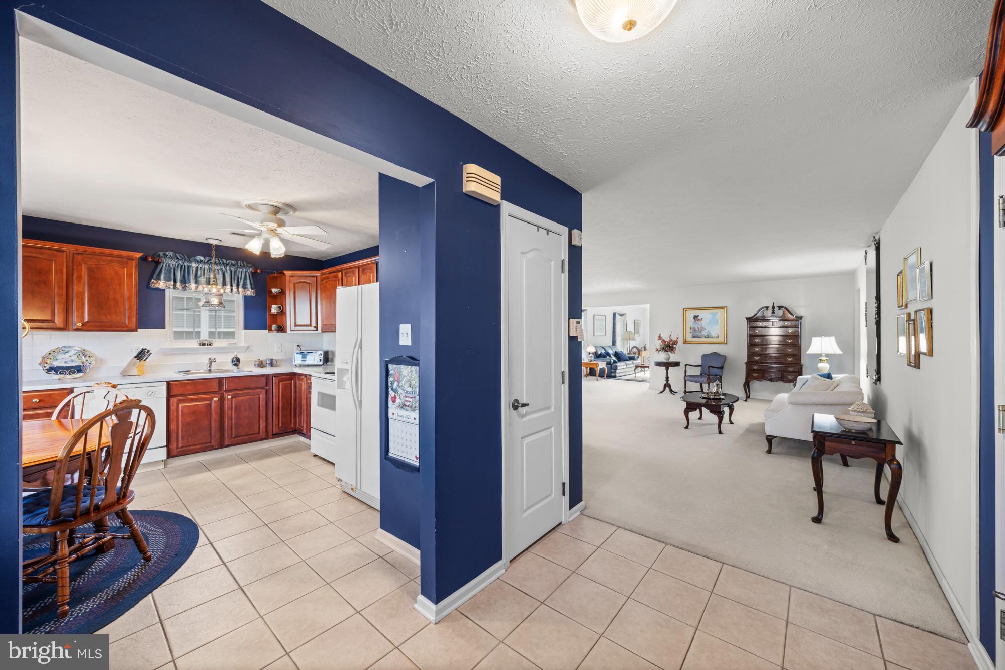 21 Brandon Lane Sewell, NJ 08080 - Photo 6 of 44 a living room with furniture a dining table and chairs