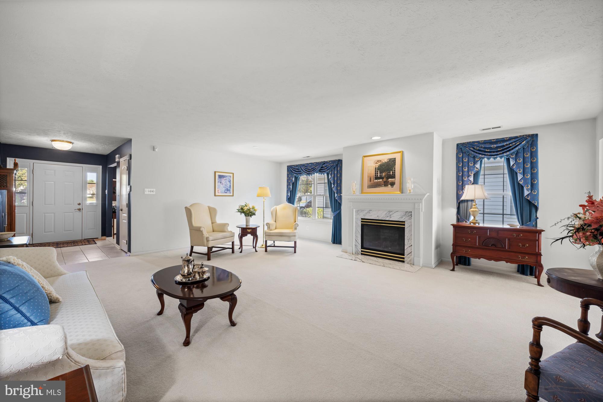 21 Brandon Lane Sewell, NJ 08080 - Photo 8 of 44 a living room with furniture and a fireplace