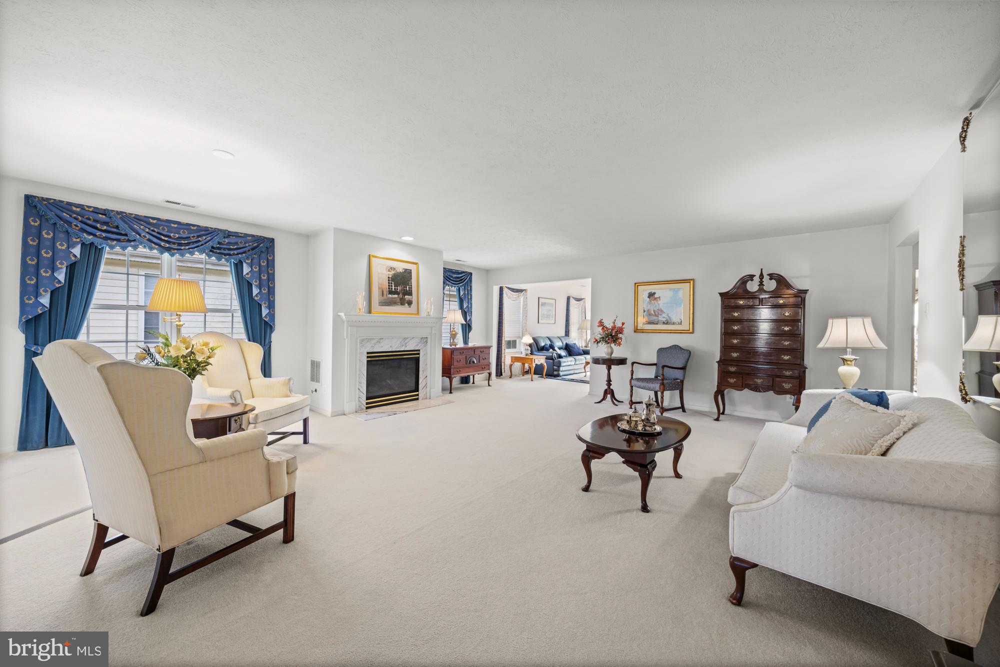 21 Brandon Lane Sewell, NJ 08080 - Photo 10 of 44 a living room with furniture and a fireplace