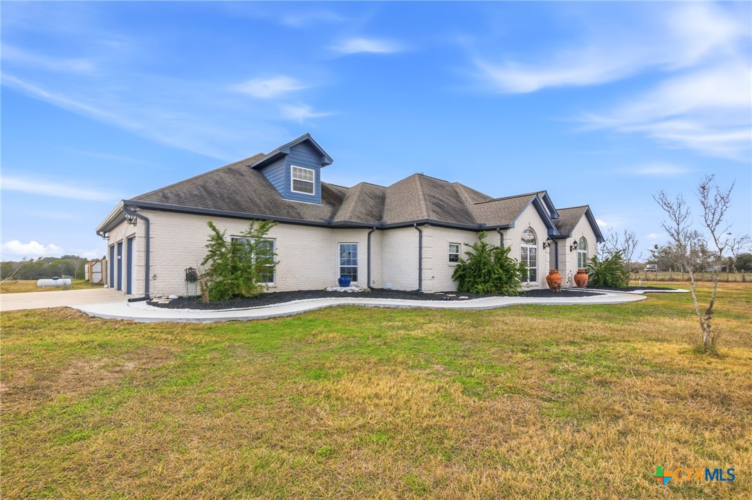 1739 Old Goliad Road Victoria, TX 77905 - Photo 2 of 43 a view of a large pool with an ocean view