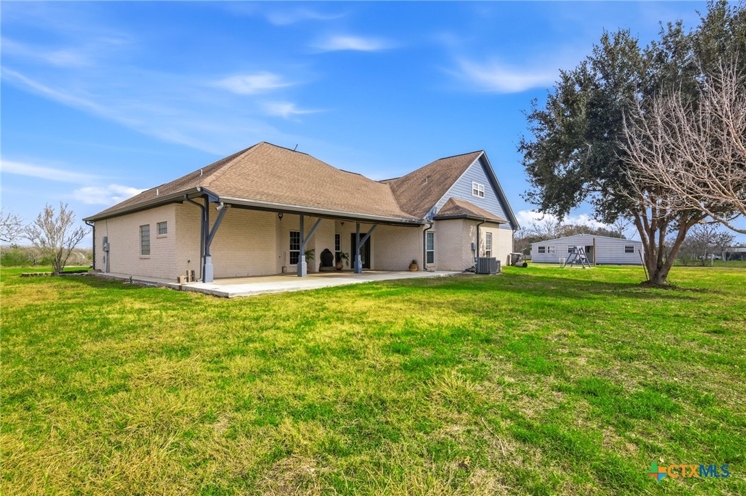 1739 Old Goliad Road Victoria, TX 77905 - Photo 33 of 43 a front view of house with yard and green space