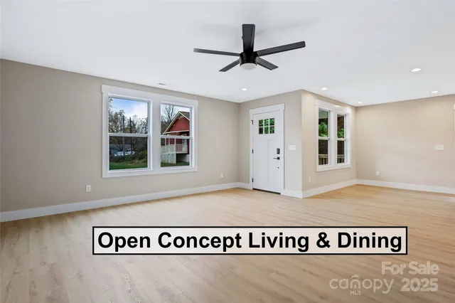a view of a kitchen with a sink and a window