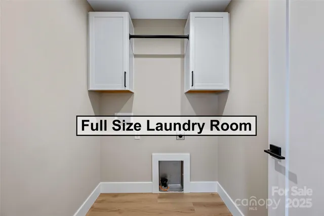 a view of kitchen cabinetry