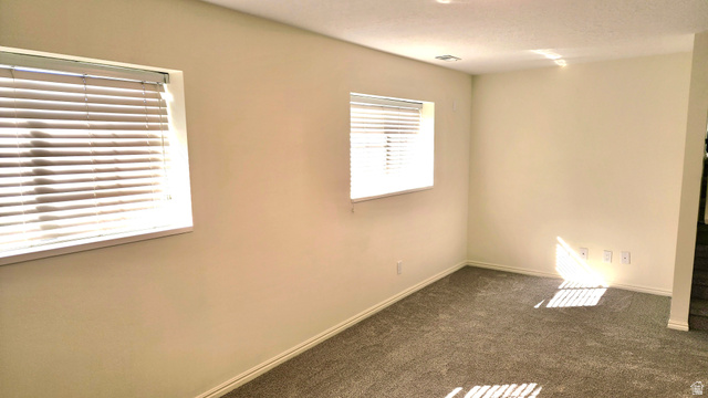 778 North 250 West Springville, UT 84663 - Photo 15 of 16 Spare room with dark colored carpet and baseboards