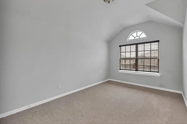 a front view of a house with outdoor seating