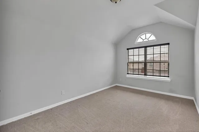 a front view of a house with outdoor seating