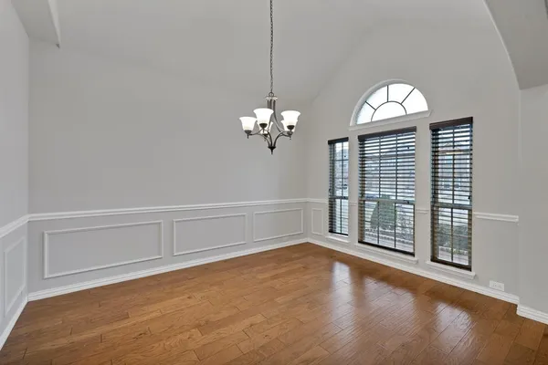 a view of a livingroom with wooden floor