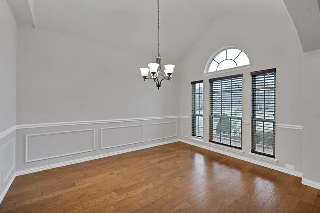 a view of a livingroom with wooden floor
