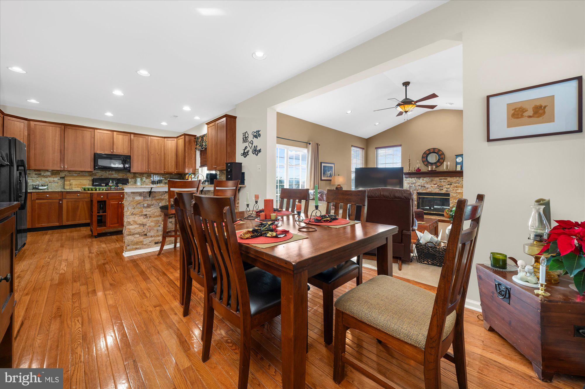 108 Hartman Road Pottstown, PA 19465 - Photo 14 of 38 a view of a dining room with furniture and wooden floor