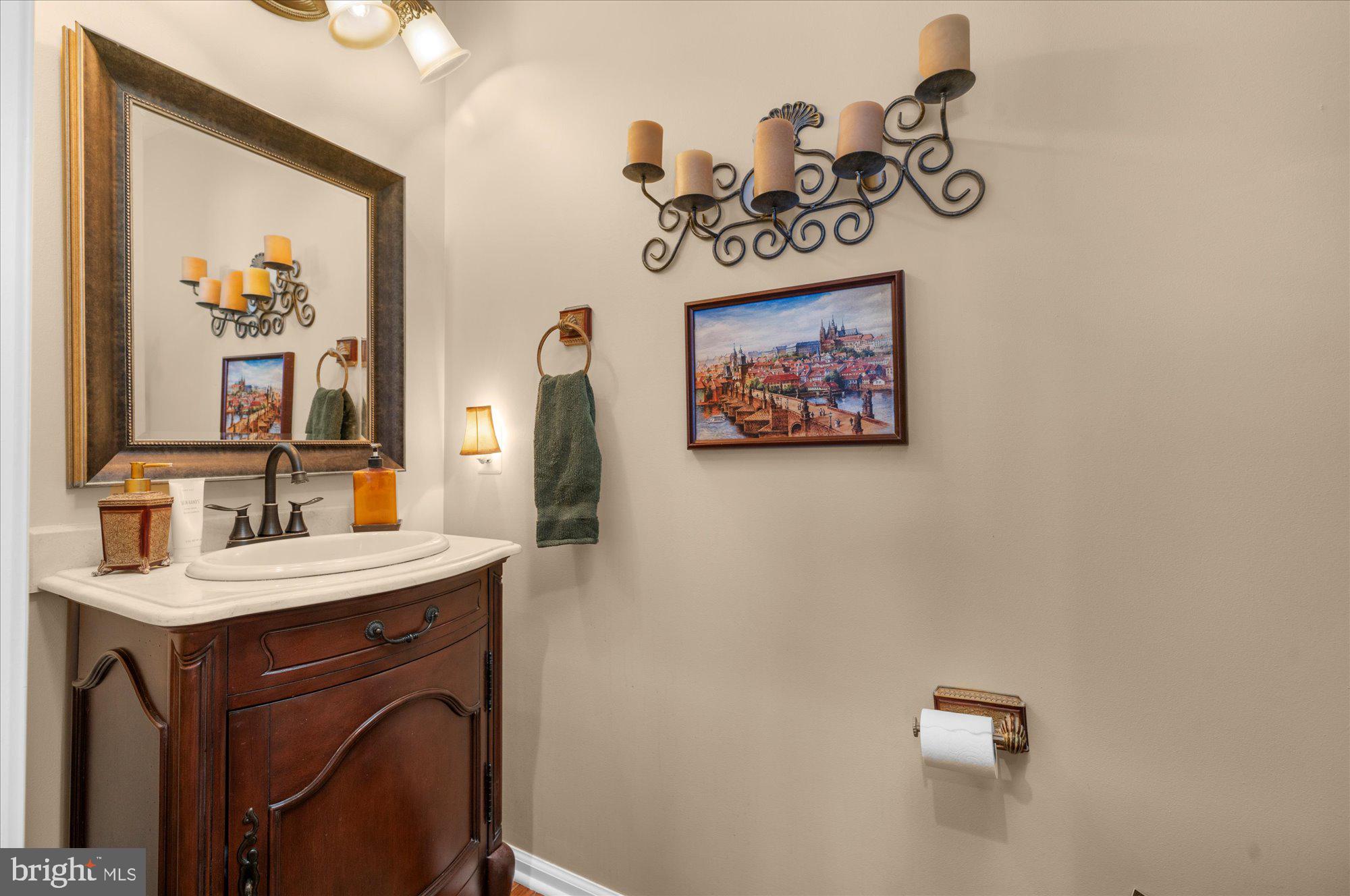 108 Hartman Road Pottstown, PA 19465 - Photo 17 of 38 a view of a bathroom with a sink and mirror