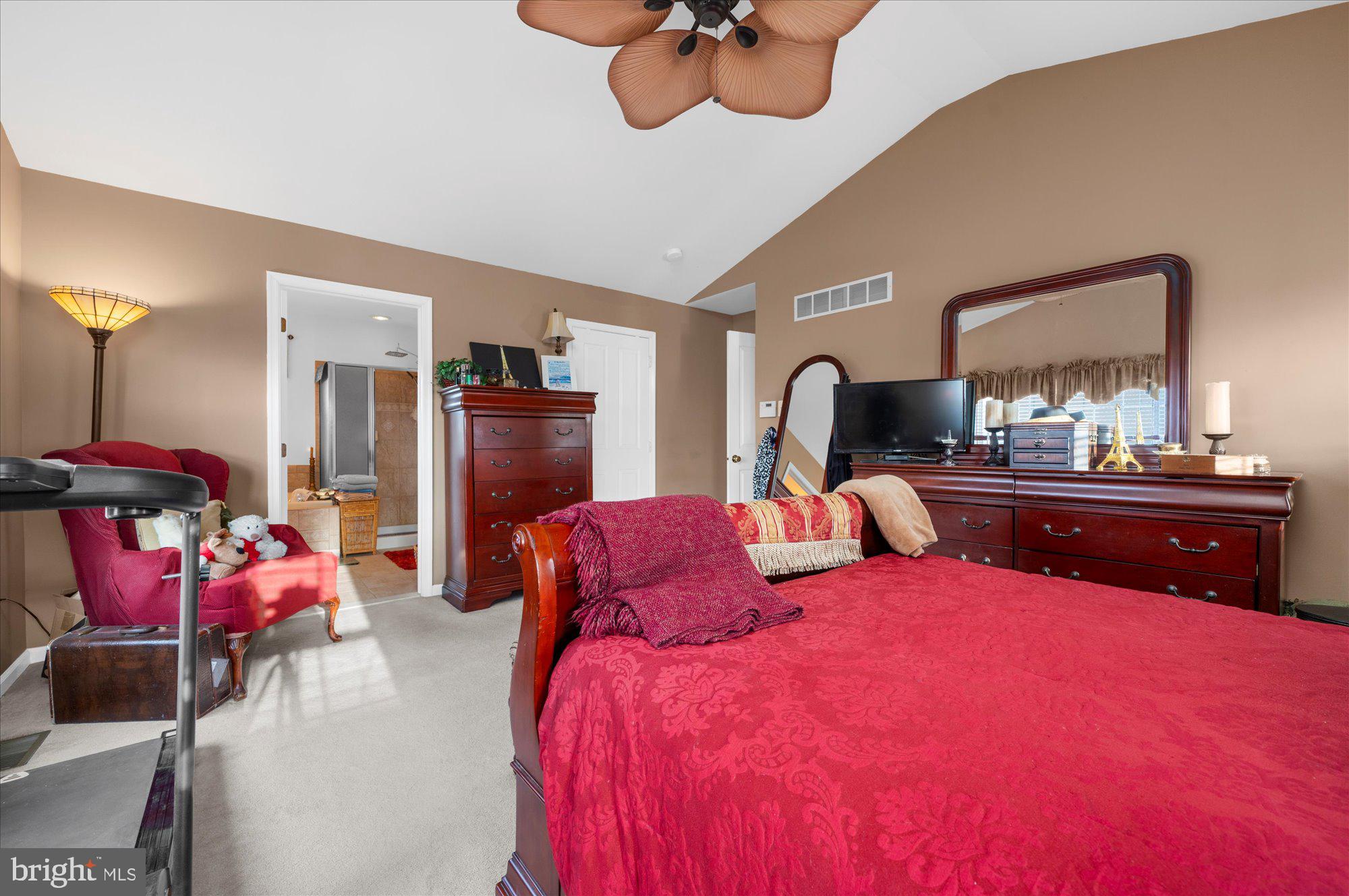 108 Hartman Road Pottstown, PA 19465 - Photo 19 of 38 a bedroom with a bed and a mirror