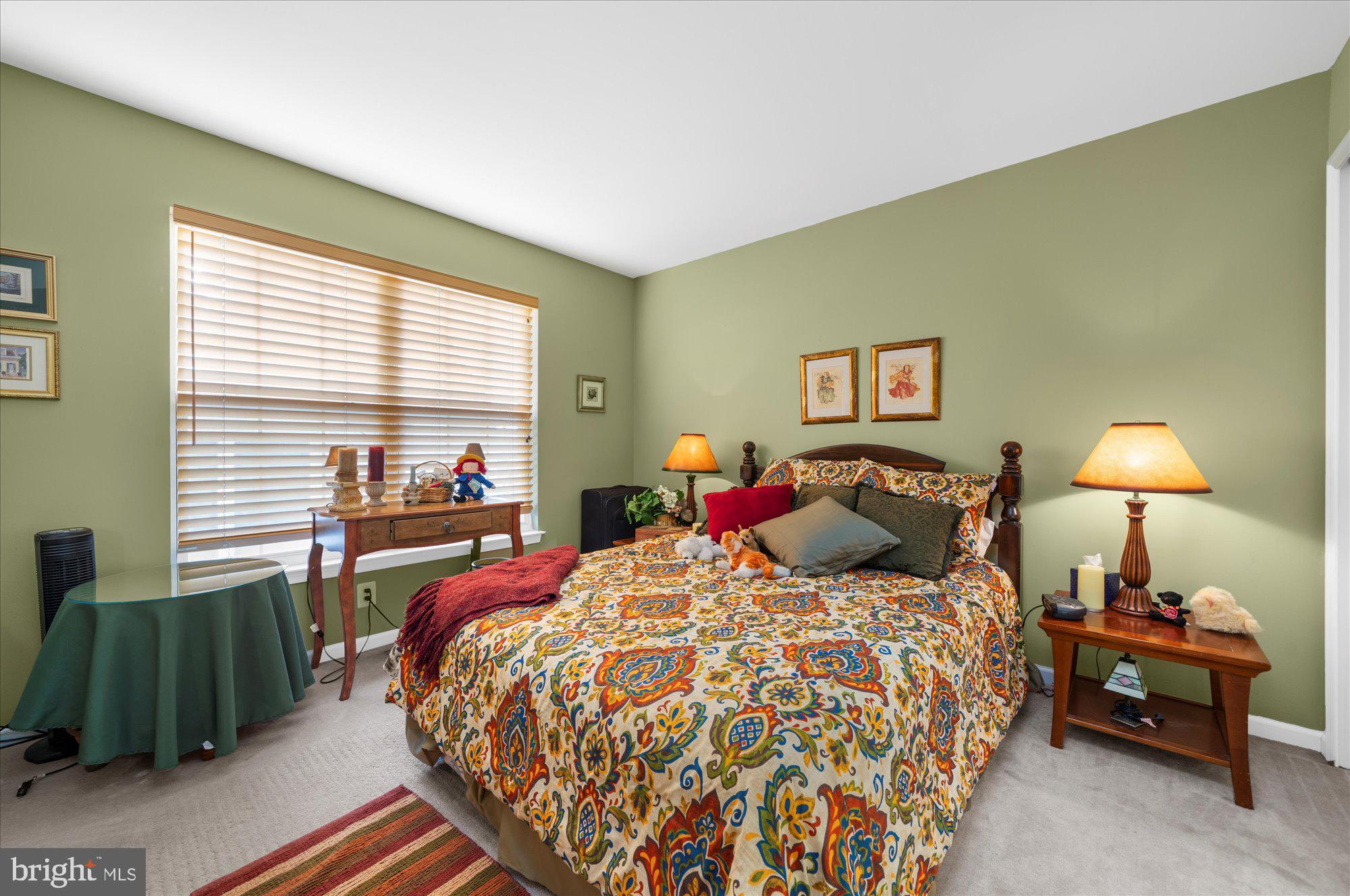108 Hartman Road Pottstown, PA 19465 - Photo 22 of 38 a bed room with a bed and a couch