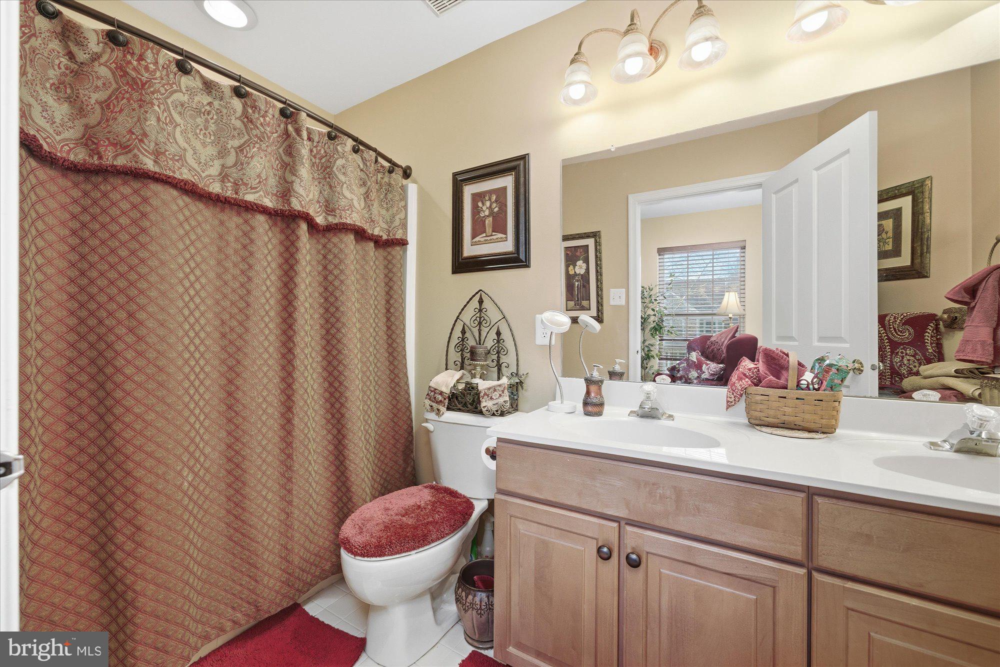 108 Hartman Road Pottstown, PA 19465 - Photo 26 of 38 a bathroom with a sink toilet and shower
