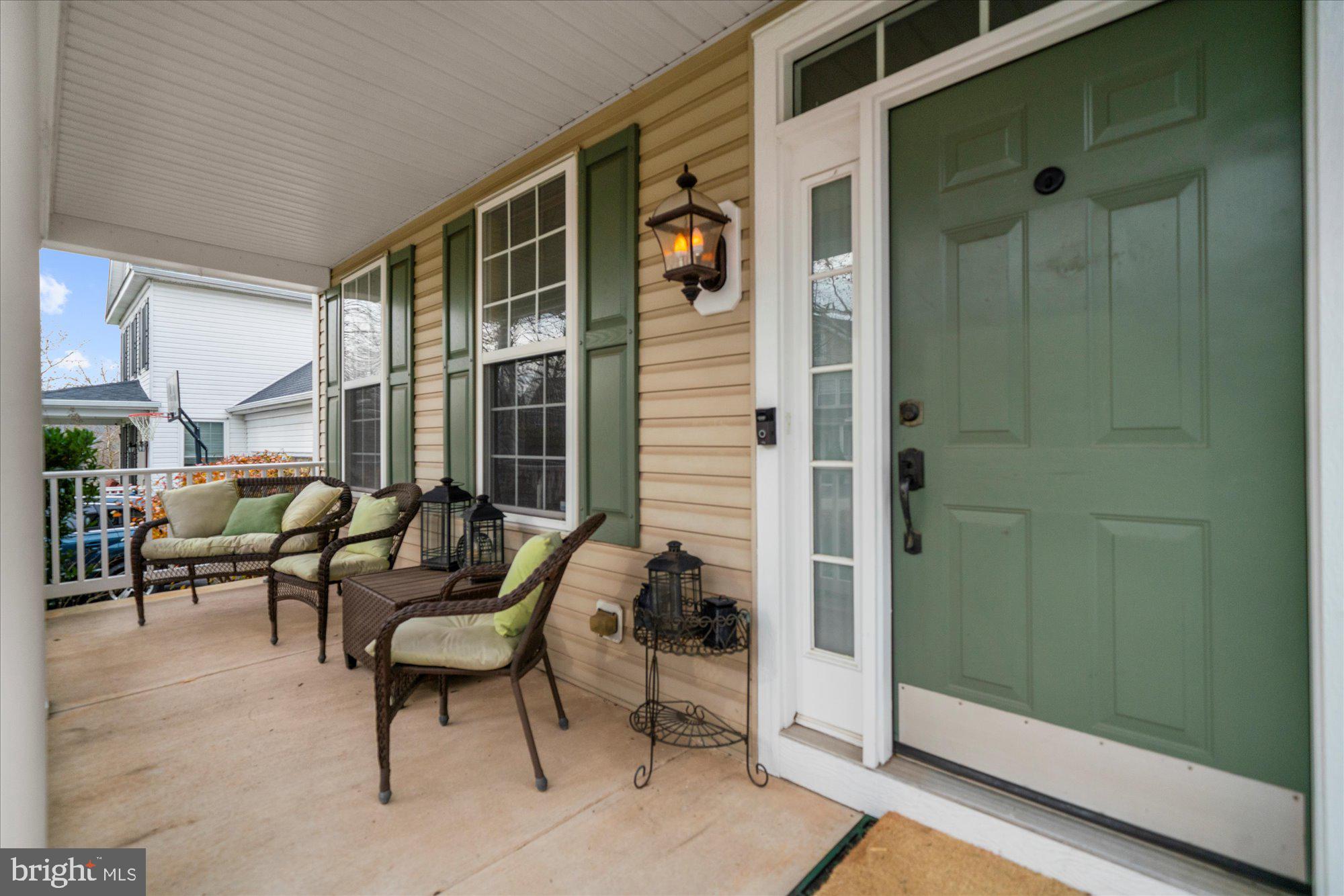 108 Hartman Road Pottstown, PA 19465 - Photo 4 of 38 a balcony with chairs and a potted plant