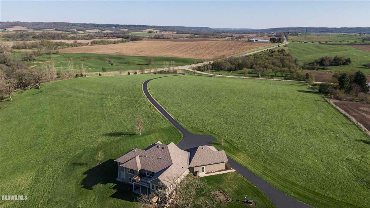 5526 Il Route South Hanover, IL 61041 - Photo 54 of 54 an aerial view of a house with a garden and lake view