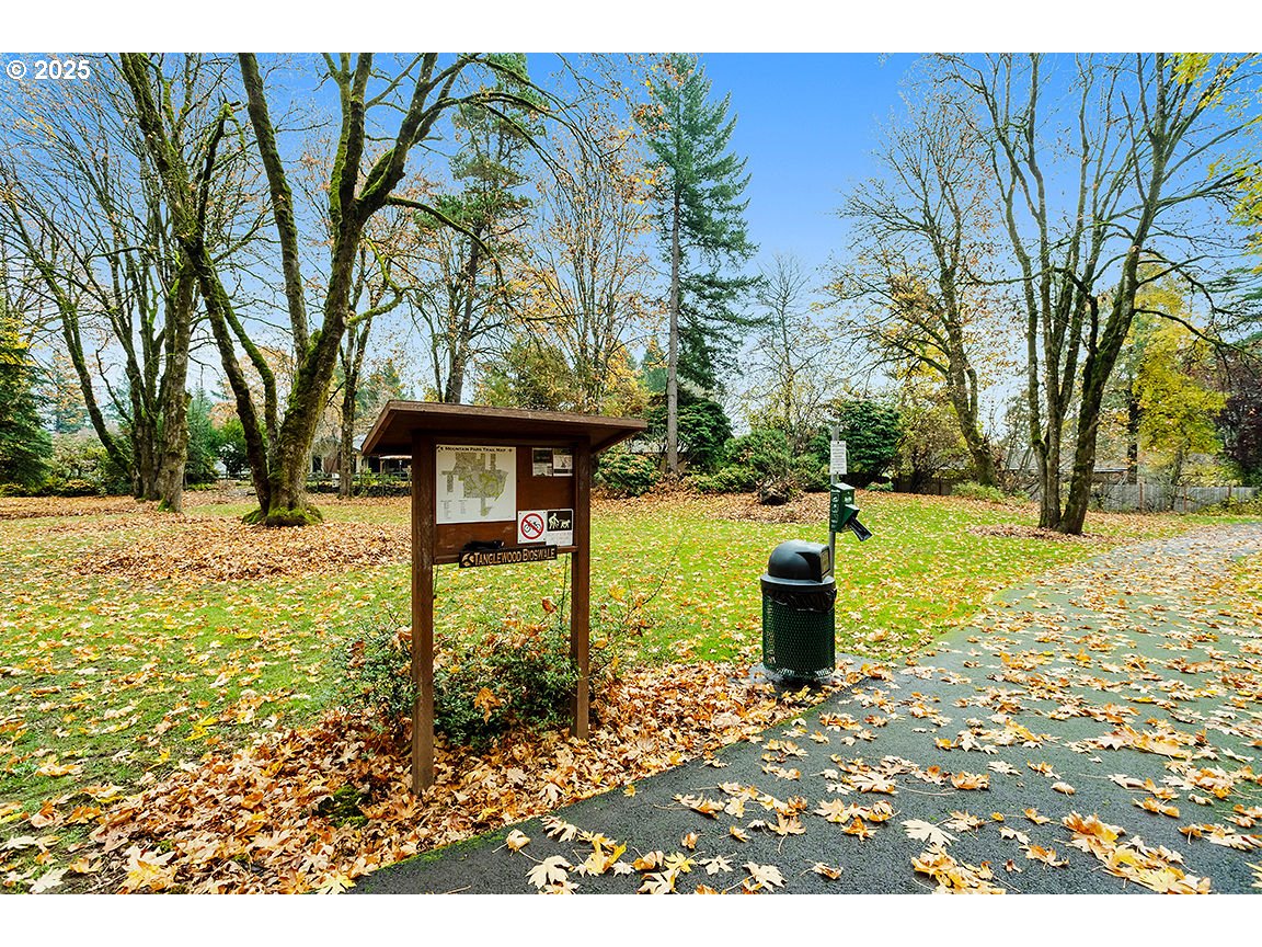 9 Britten Court Lake Oswego, OR 97035 - Photo 38 of 48 a front view of a house with a yard