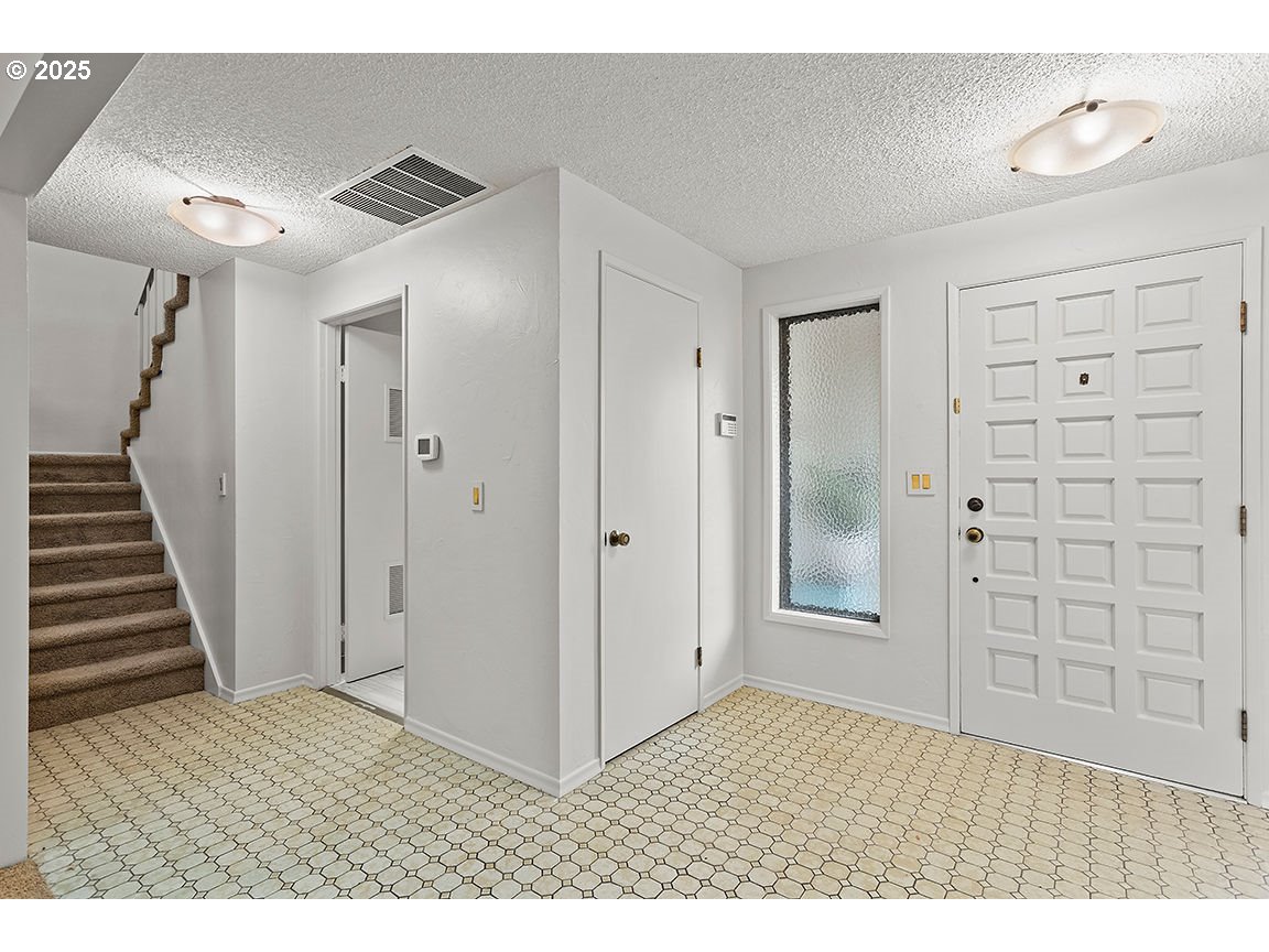 9 Britten Court Lake Oswego, OR 97035 - Photo 6 of 48 a view of wooden floor in an empty room