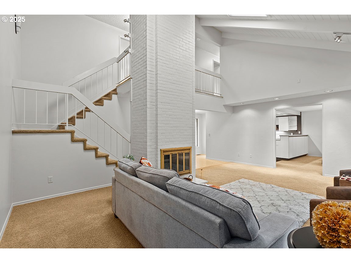 9 Britten Court Lake Oswego, OR 97035 - Photo 9 of 48 a bedroom with a bed and a painting on the wall