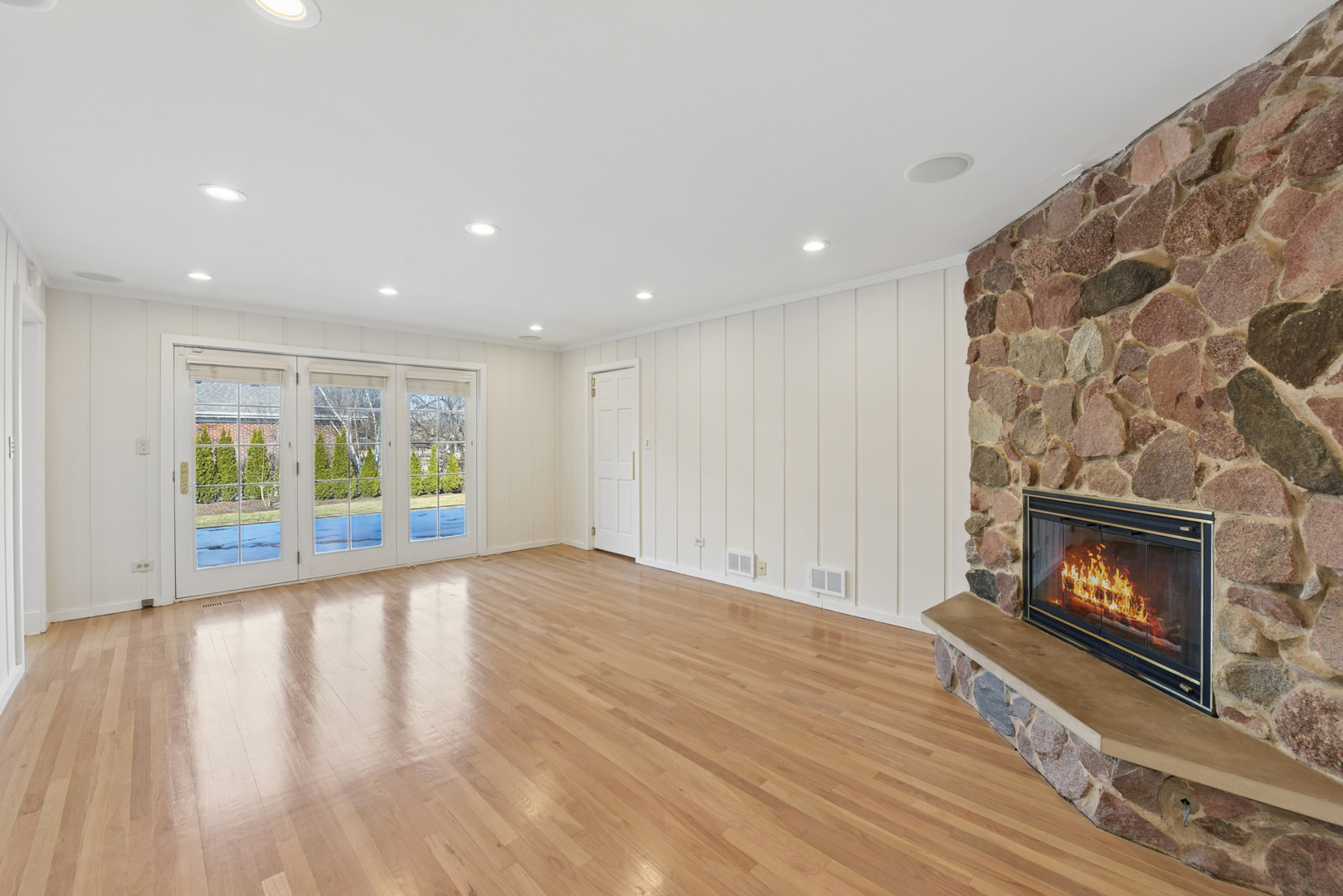 1500 Gordon Terrace Deerfield, IL 60015 - Photo 15 of 36 a view of an empty room with wooden floor fireplace and a window