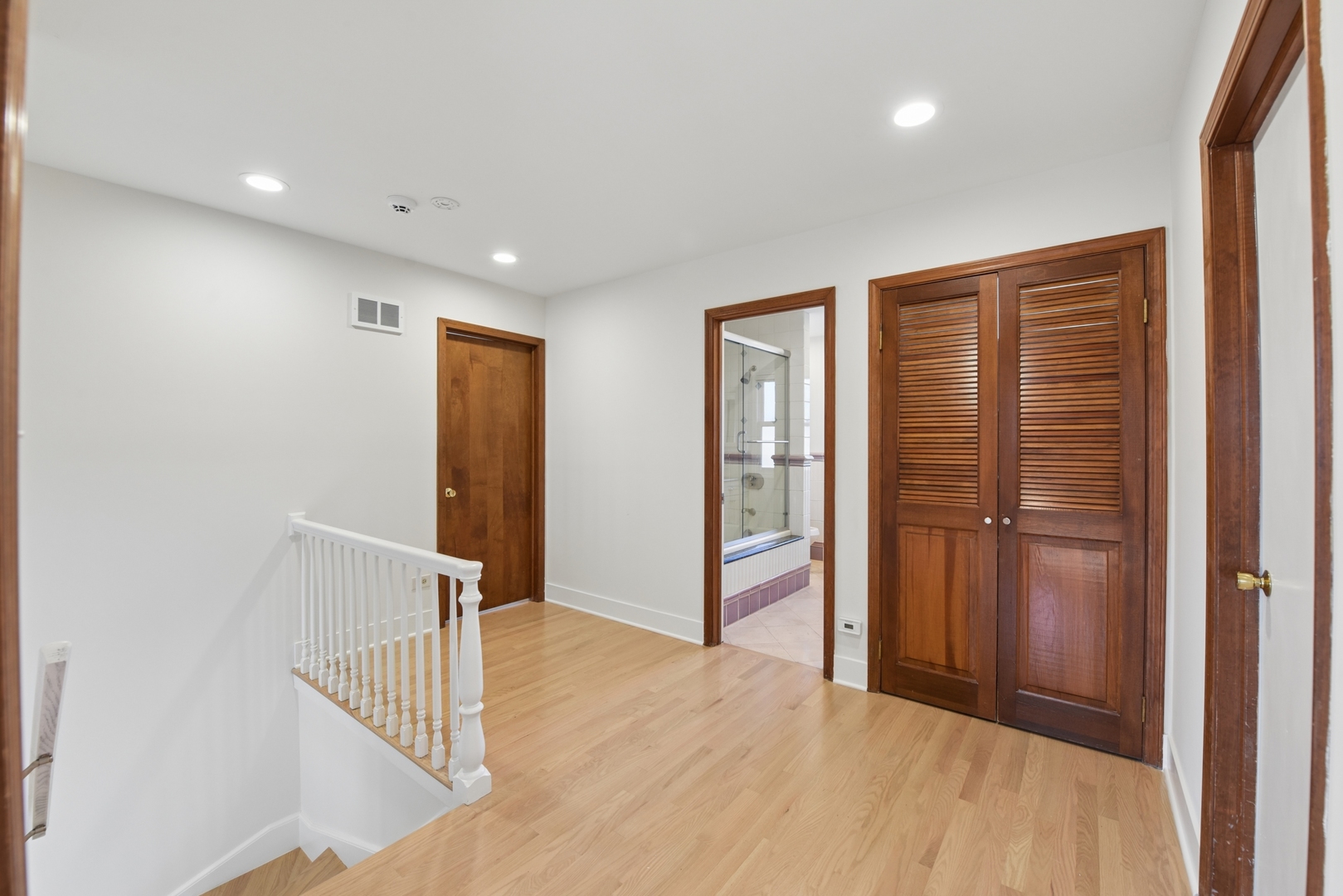 1500 Gordon Terrace Deerfield, IL 60015 - Photo 17 of 36 wooden floor in an empty room with a window