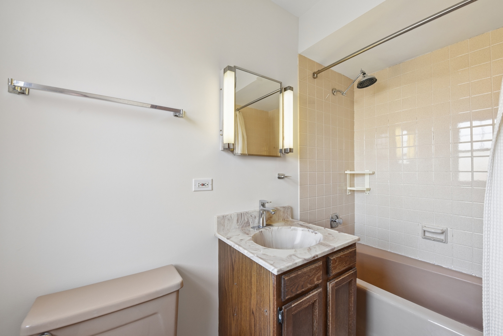 1500 Gordon Terrace Deerfield, IL 60015 - Photo 21 of 36 a bathroom with a sink toilet vanity and shower