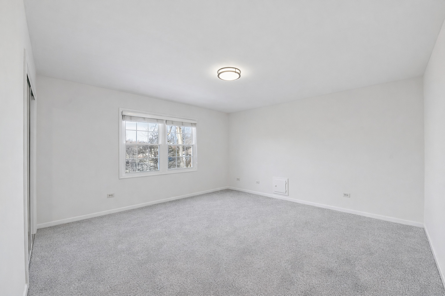 1500 Gordon Terrace Deerfield, IL 60015 - Photo 23 of 36 an empty room with a window