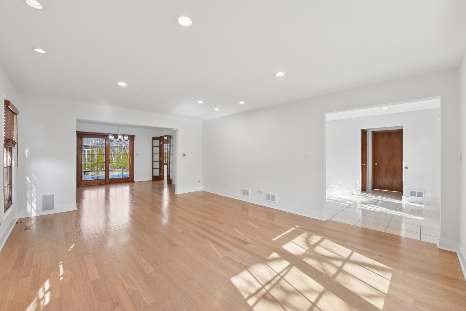 1500 Gordon Terrace Deerfield, IL 60015 - Photo 6 of 36 a view of an empty room with wooden floor and a window