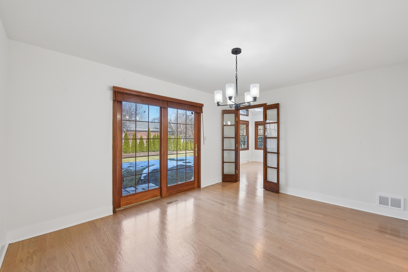 1500 Gordon Terrace Deerfield, IL 60015 - Photo 8 of 36 a view of empty room with wooden floor and fireplace