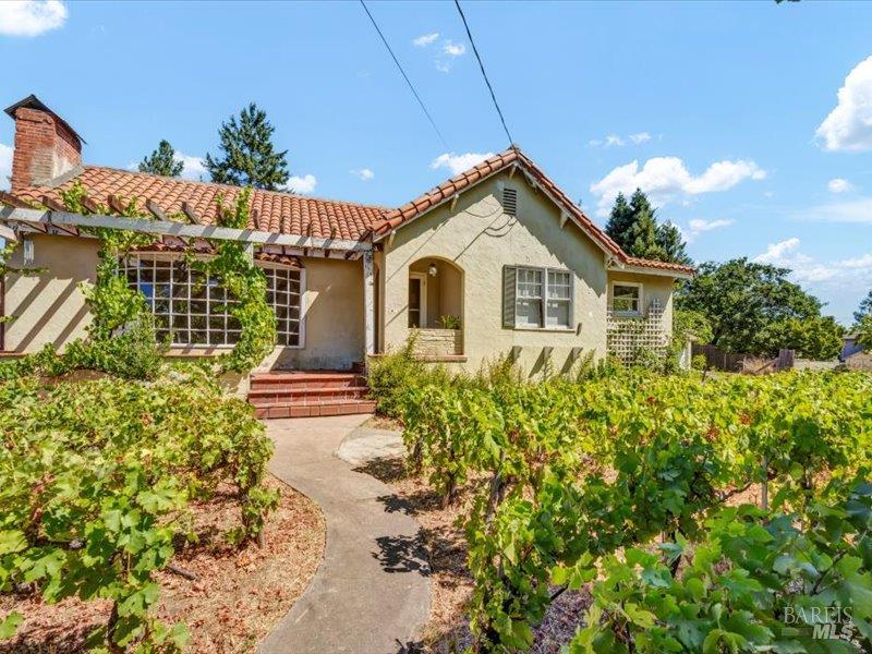 315 White Cottage Road North Angwin, CA 94508 - Photo 2 of 9 a front view of a house with a garden