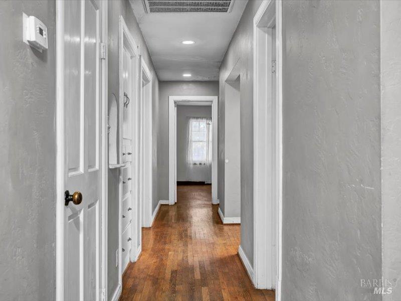 315 White Cottage Road North Angwin, CA 94508 - Photo 9 of 9 a view of a hallway with wooden floor