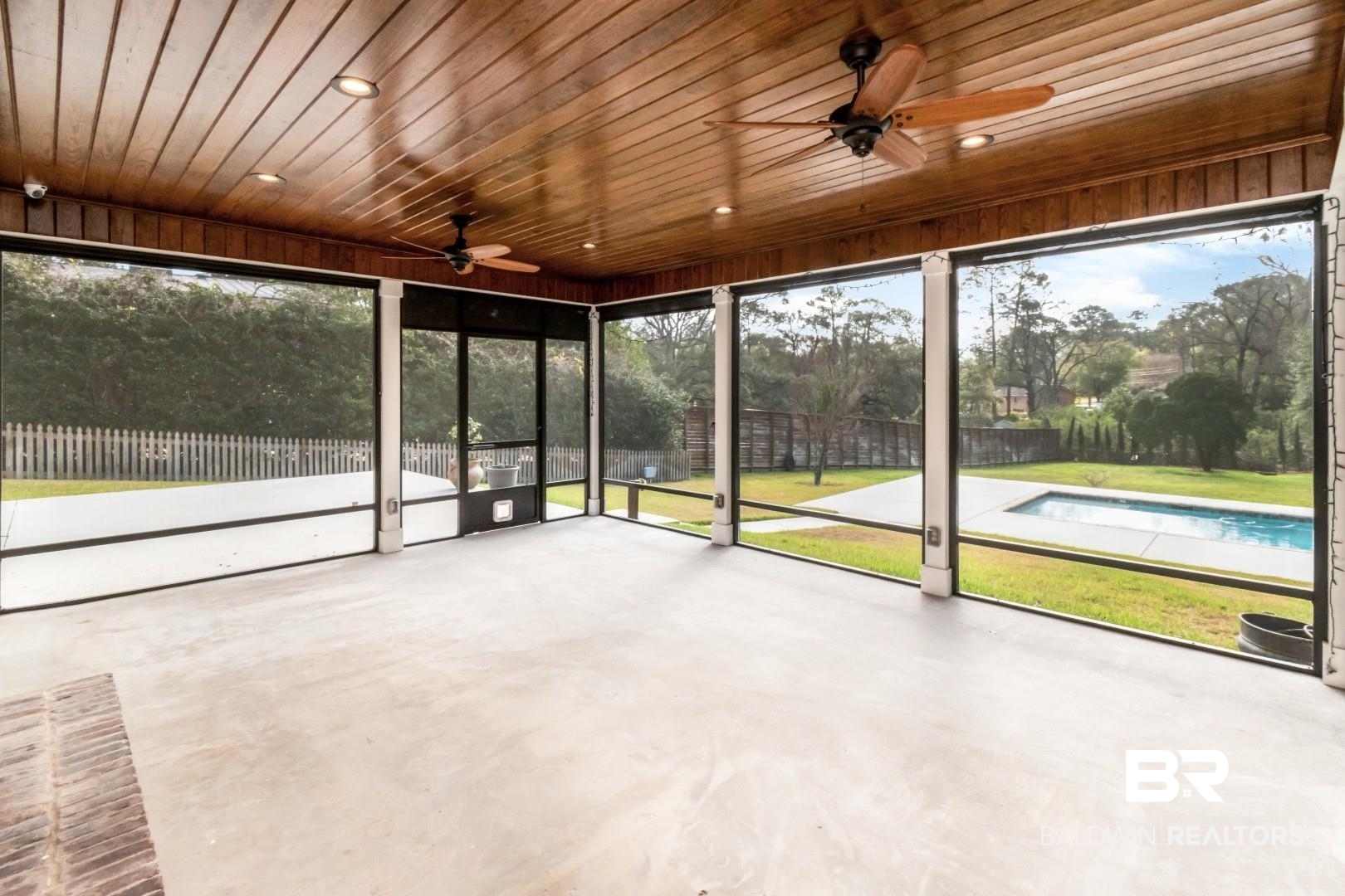 231 Rochester Road Mobile, AL 36608 - Photo 37 of 51 Unfurnished sunroom with ceiling fan